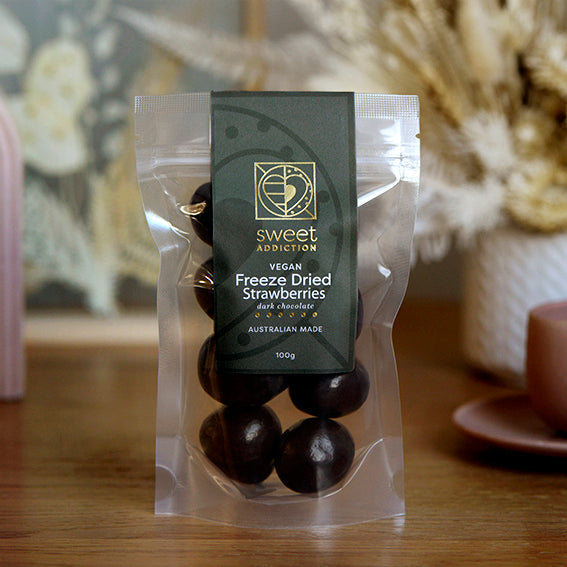 100g bag of vegan dark chocolate coated freeze dried strawberries, made in Melbourne, Australia