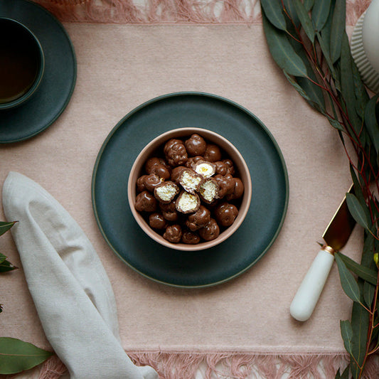 100g pouch of Australian-made milk chocolate covered caramel popcorn, wholesale