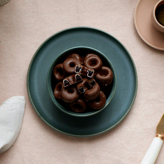 120g bag of dark chocolate coated aniseed rings, made in Melbourne, Australia