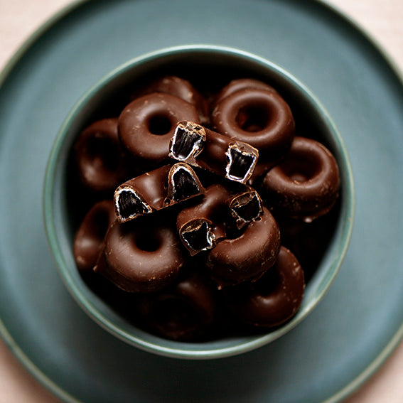 120g bag of dark chocolate coated aniseed rings, made in Melbourne, Australia