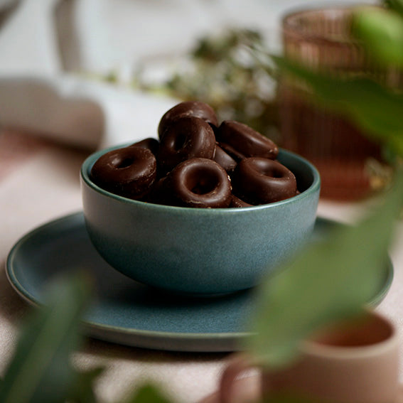 120g bag of dark chocolate coated aniseed rings, made in Melbourne, Australia