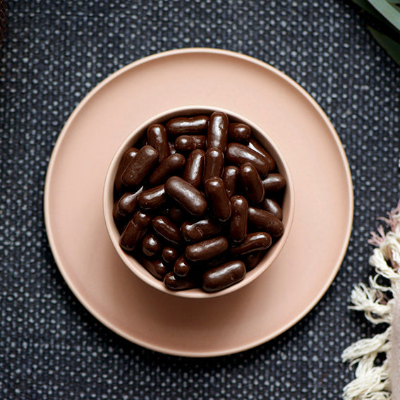 150g bag of dark chocolate coated raspberry bullets, made in Melbourne, Australia