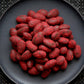 120g bag of raspberry dusted dark chocolate coated almonds, made in Melbourne, Australia