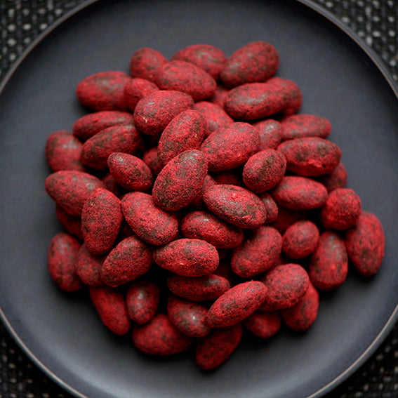 120g bag of raspberry dusted dark chocolate coated almonds, made in Melbourne, Australia