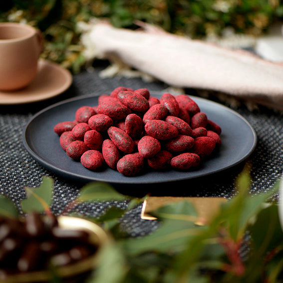 120g bag of raspberry dusted dark chocolate coated almonds, made in Melbourne, Australia