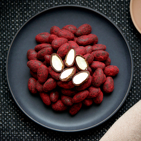 120g bag of raspberry dusted dark chocolate coated almonds, made in Melbourne, Australia