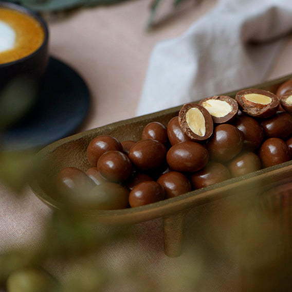 150g bag of milk chocolate coated roasted almonds, made in Melbourne, Australia