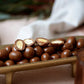 150g bag of milk chocolate coated roasted almonds, made in Melbourne, Australia