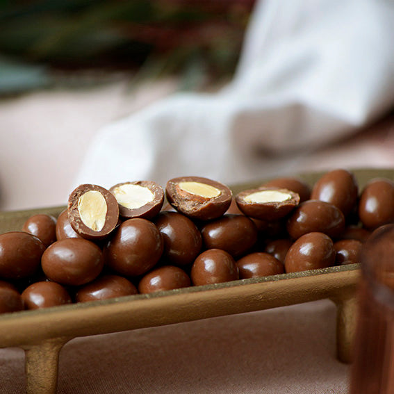 150g bag of milk chocolate coated roasted almonds, made in Melbourne, Australia