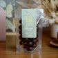 150g bag of milk chocolate coated roasted almonds, made in Melbourne, Australia