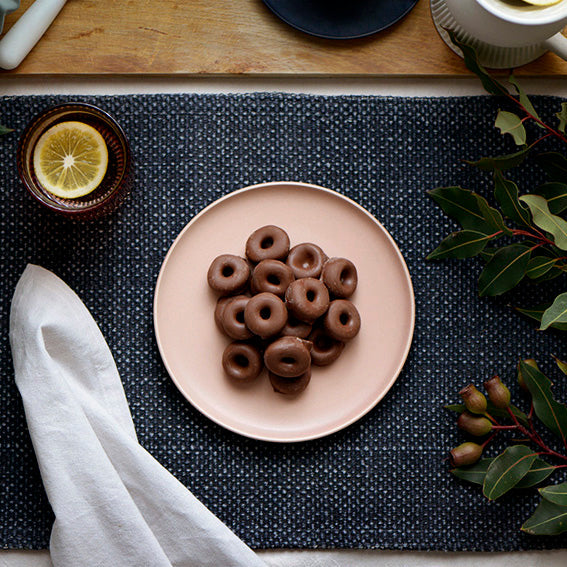 120g bag of milk chocolate coated aniseed rings, made in Melbourne, Australia