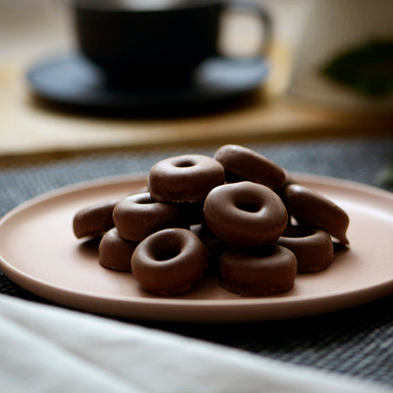 120g bag of milk chocolate coated aniseed rings, made in Melbourne, Australia