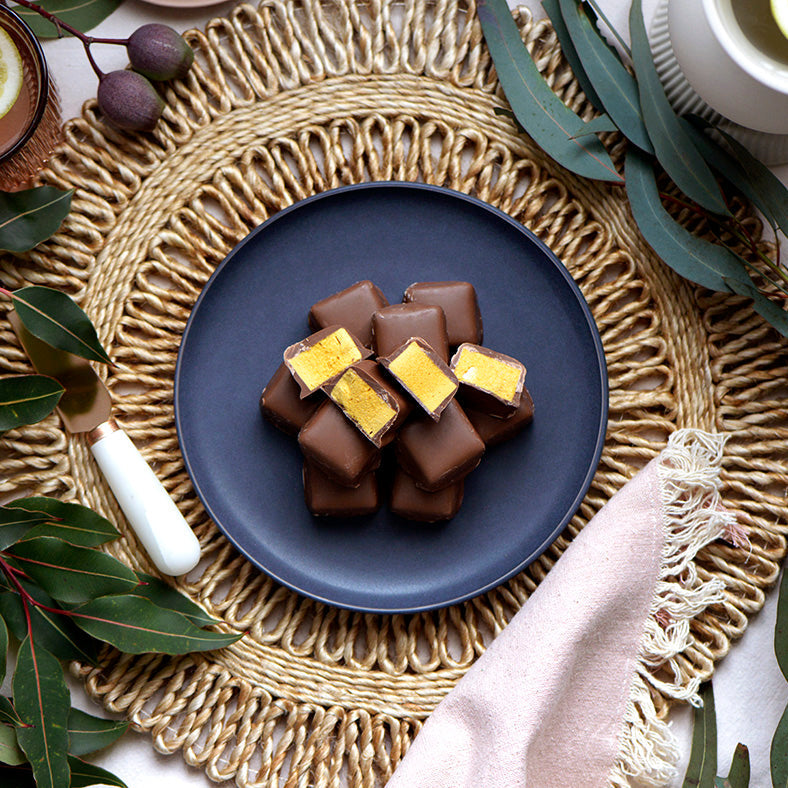 90g bag of gluten free milk chocolate coated honeycomb, made in Melbourne, Australia