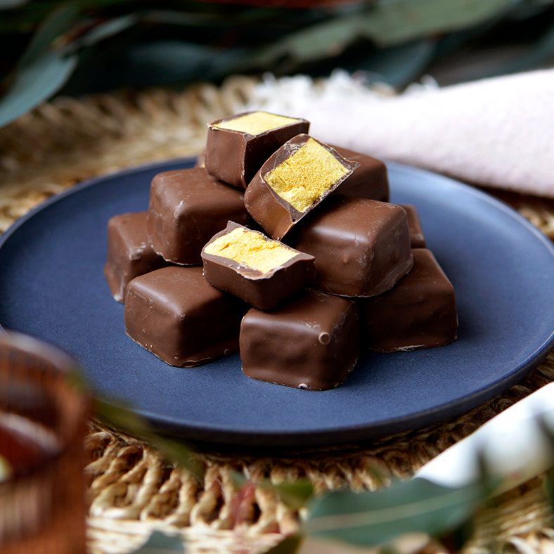 90g bag of gluten free milk chocolate coated honeycomb, made in Melbourne, Australia