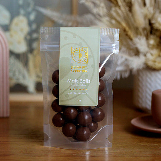 120g bag of milk chocolate coated malt balls, made in Melbourne, Australia