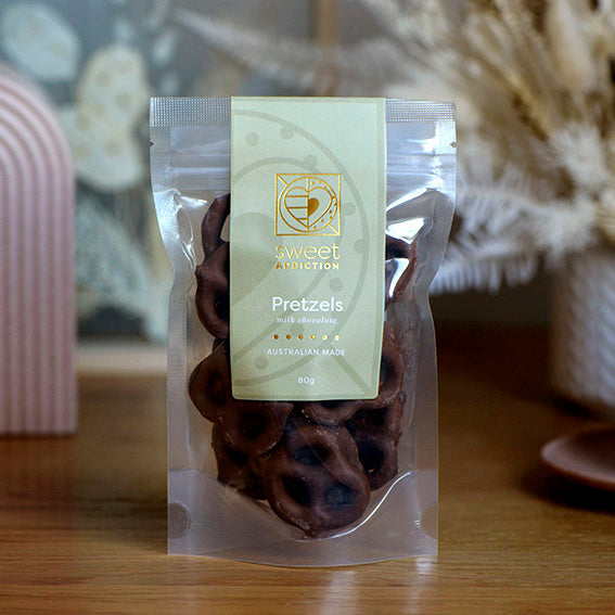 80g bag of milk chocolate covered pretzels, made in Melbourne, Australia
