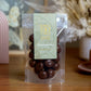 150g bag of milk chocolate coated jelly raspberries, made in Melbourne, Australia