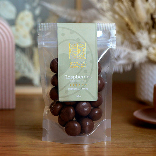150g bag of milk chocolate coated jelly raspberries, made in Melbourne, Australia