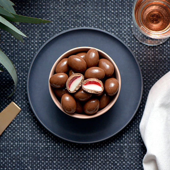 150g bag of milk chocolate coated strawberry and cream lollies, made in Melbourne, Australia