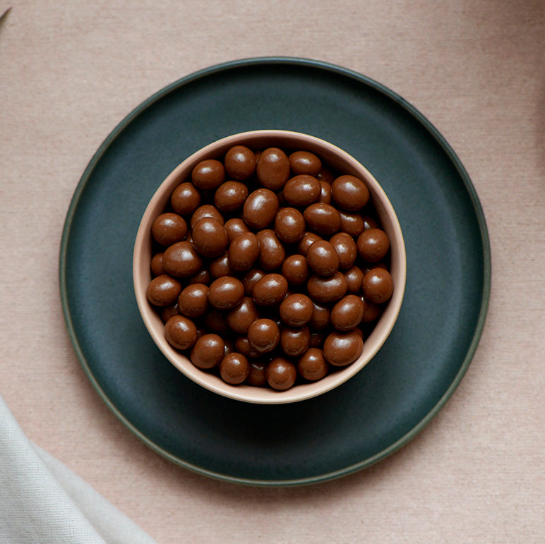 150g bag of milk chocolate coated sultanas, made in Melbourne, Australia