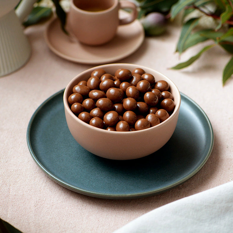 150g bag of milk chocolate coated sultanas, made in Melbourne, Australia