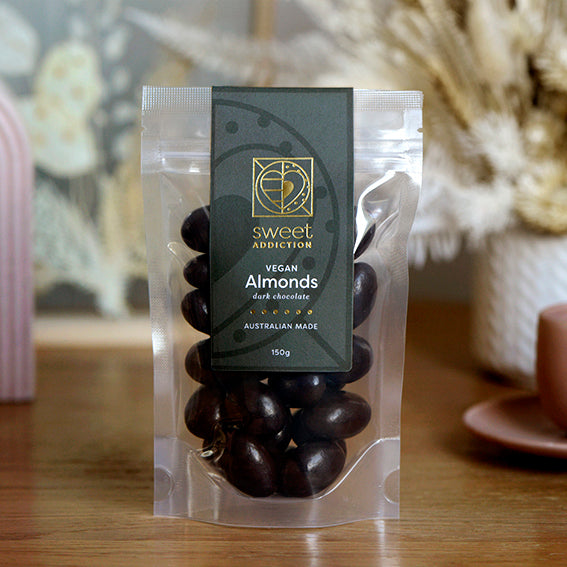 150g bag of vegan dark chocolate coated roasted almonds, made in Melbourne, Australia