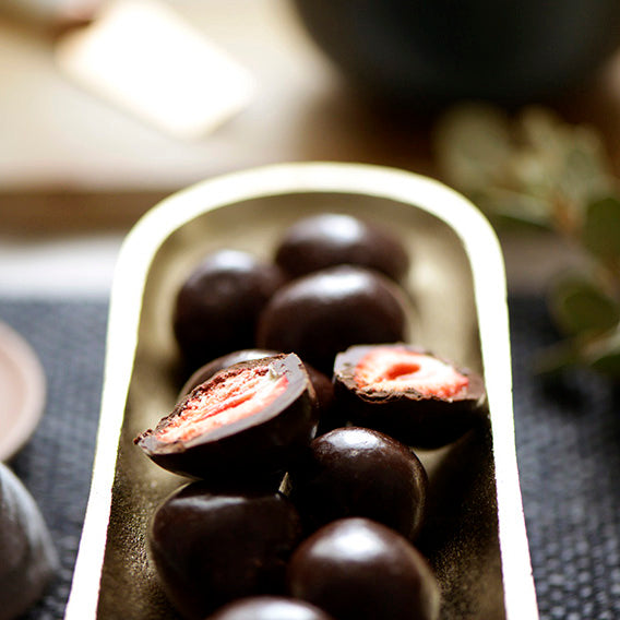 100g bag of vegan dark chocolate coated freeze dried strawberries, made in Melbourne, Australia