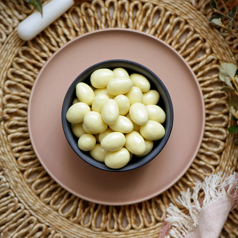 120g bag of white chocolate covered roasted almonds, made in Melbourne, Australia