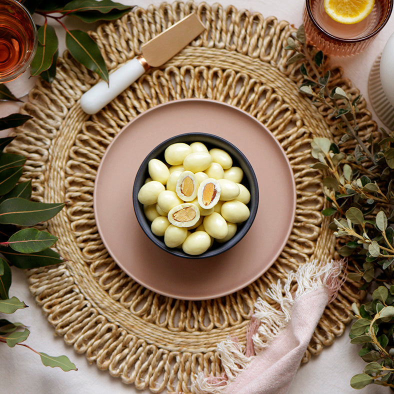 120g bag of white chocolate covered roasted almonds, made in Melbourne, Australia
