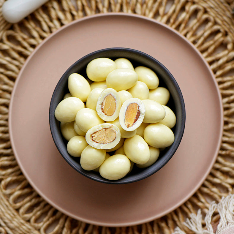 120g bag of white chocolate covered roasted almonds, made in Melbourne, Australia