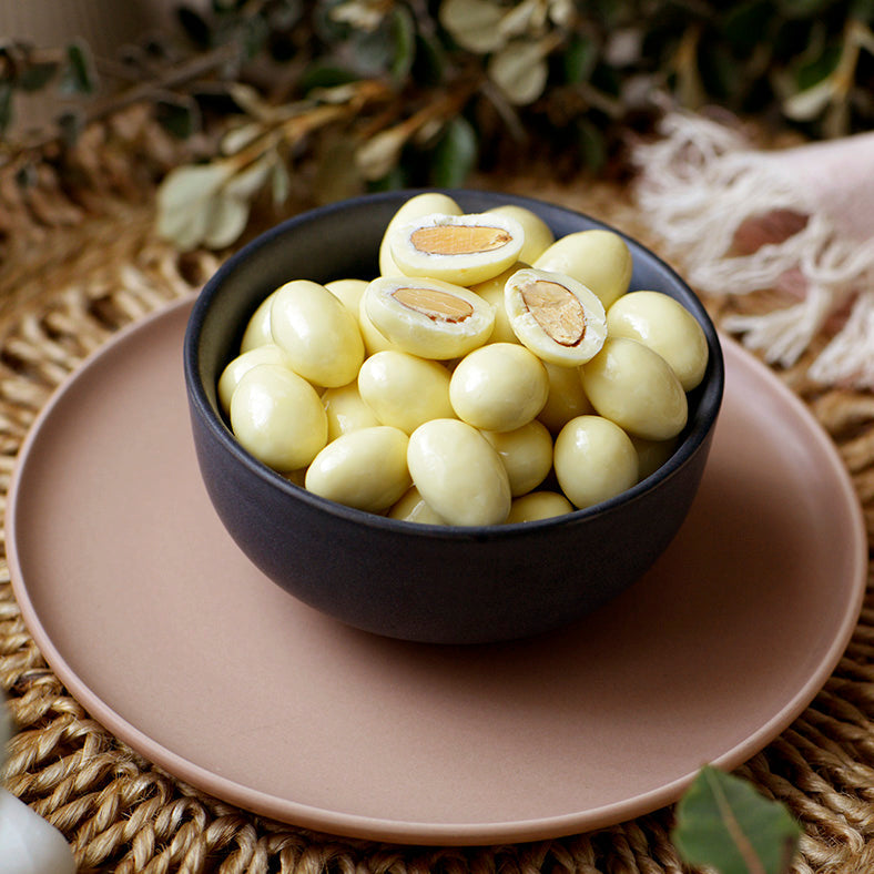 120g bag of white chocolate covered roasted almonds, made in Melbourne, Australia