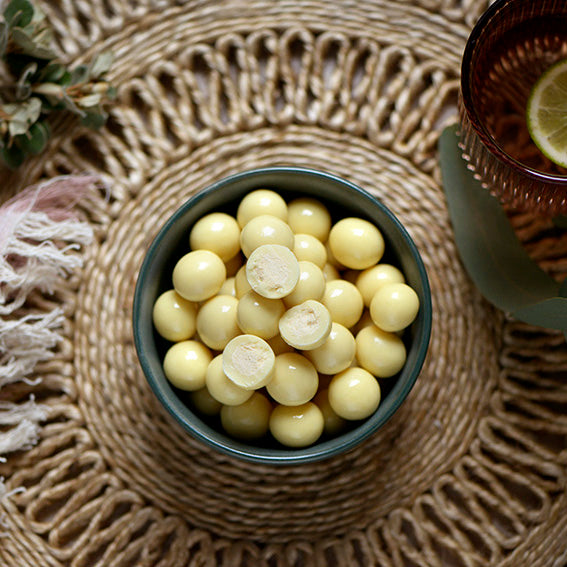 120g bag of white chocolate coated malt balls, made in Melbourne, Australia