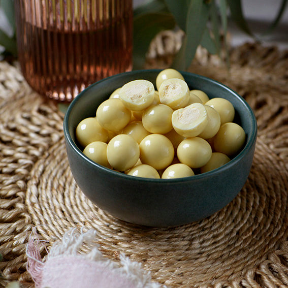120g bag of white chocolate coated malt balls, made in Melbourne, Australia