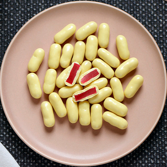 150g bag of white chocolate coated raspberry bullets, made in Melbourne, Australia